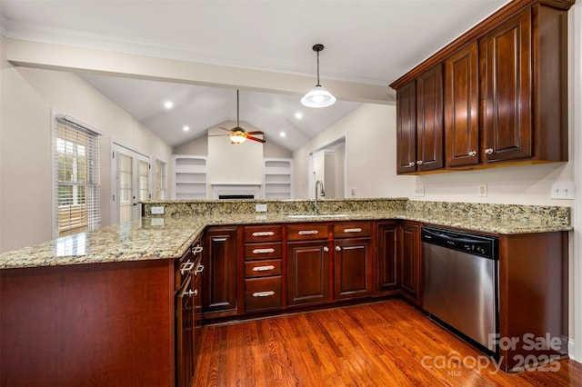 182 Kensington Dr, Forest City, NC 28043 - kitchen with dishwasher, a sink, dark wood-style flooring, ceiling fan, and lofted ceiling