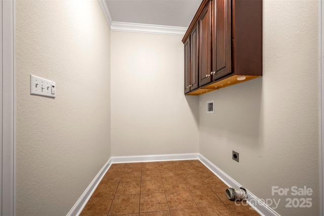 182 Kensington Dr, Forest City, NC 28043 - laundry area featuring hookup for an electric dryer, cabinet space, crown molding, tile patterned floors, and washer hookup