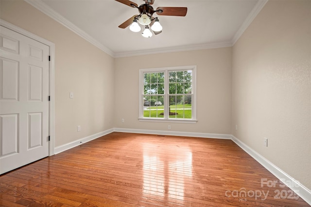 182 Kensington Dr, Forest City, NC 28043 - empty room featuring light wood finished floors, ceiling fan, crown molding, and baseboards
