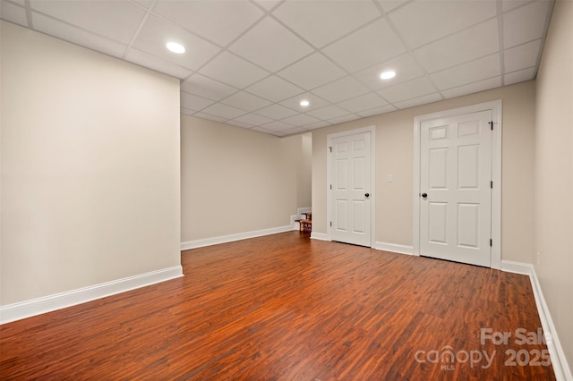 182 Kensington Dr, Forest City, NC 28043 - finished below grade area with wood finished floors, recessed lighting, baseboards, and a drop ceiling
