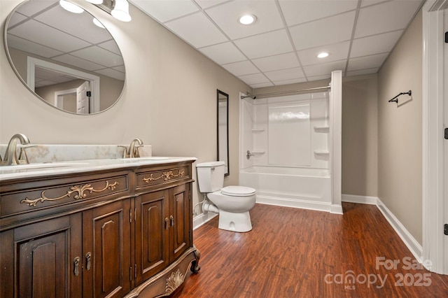 182 Kensington Dr, Forest City, NC 28043 - full bath featuring a paneled ceiling, baseboards, vanity, toilet, and wood finished floors