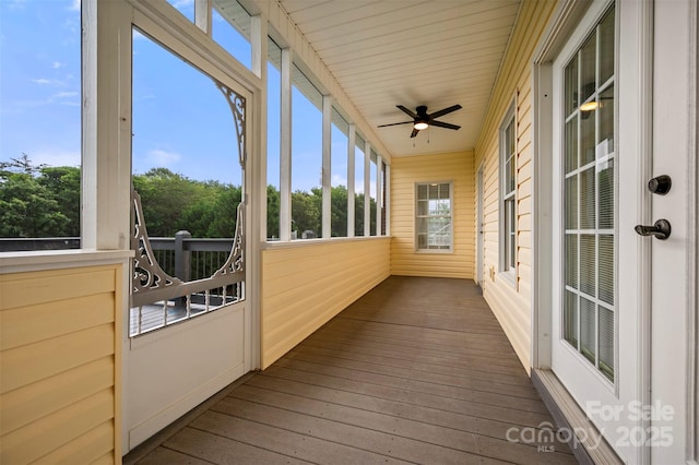 182 Kensington Dr, Forest City, NC 28043 - unfurnished sunroom with ceiling fan and hardwood / wood-style floors