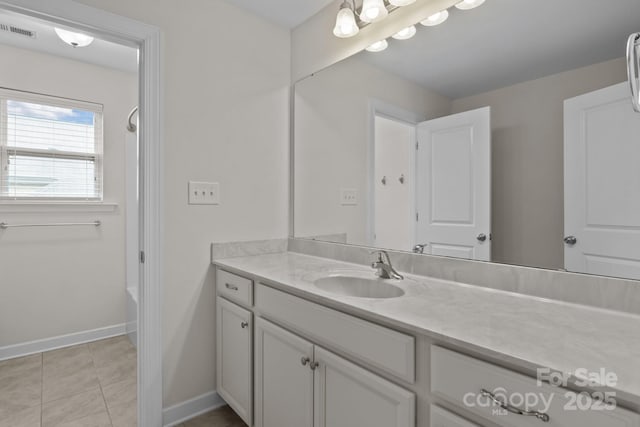 308 Planters Way, Mount Holly, NC 28120 - bathroom featuring vanity, shower / bath combination, and baseboards