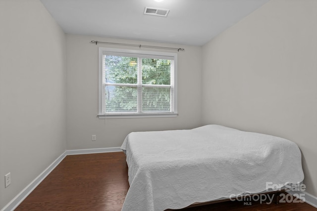 308 Planters Way, Mount Holly, NC 28120 - bedroom featuring wood finished floors and baseboards