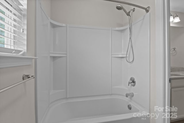 308 Planters Way, Mount Holly, NC 28120 - bathroom featuring shower / tub combination and vanity
