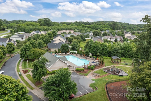 308 Planters Way, Mount Holly, NC 28120 - aerial perspective of suburban area featuring a pool area
