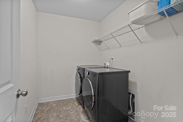 308 Planters Way, Mount Holly, NC 28120 - laundry room featuring separate washer and dryer and baseboards