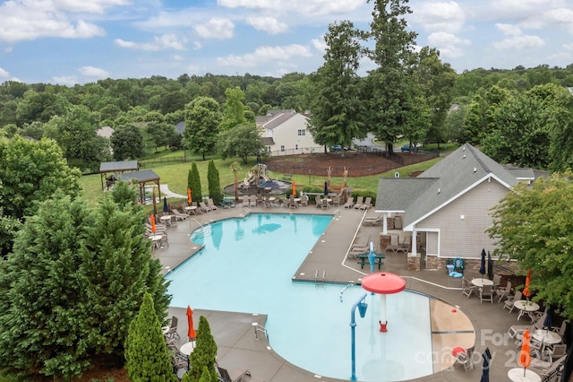 308 Planters Way, Mount Holly, NC 28120 - community pool with a patio