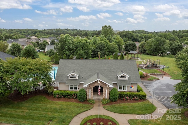 308 Planters Way, Mount Holly, NC 28120 - cape cod home featuring a front lawn and uncovered parking