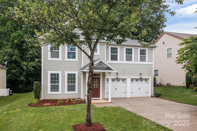 308 Planters Way, Mount Holly, NC 28120 - view of front of house with a garage, driveway, and a front yard