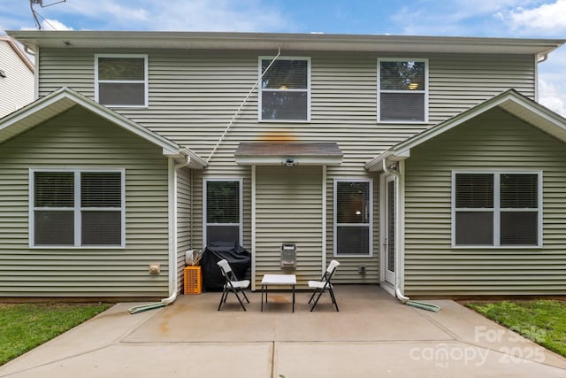 308 Planters Way, Mount Holly, NC 28120 - back of house with a patio