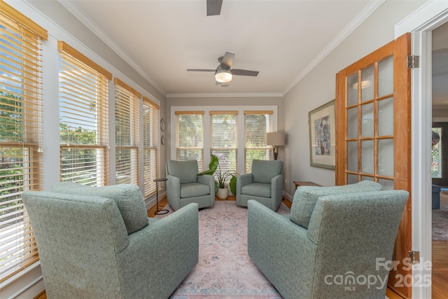 141 Eastover Dr SE, Concord, NC 28025 - living area with ceiling fan, crown molding, and wood finished floors