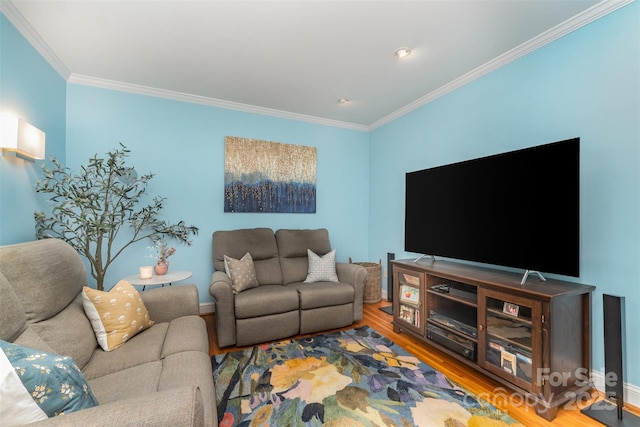 141 Eastover Dr SE, Concord, NC 28025 - living area with wood finished floors, crown molding, and baseboards