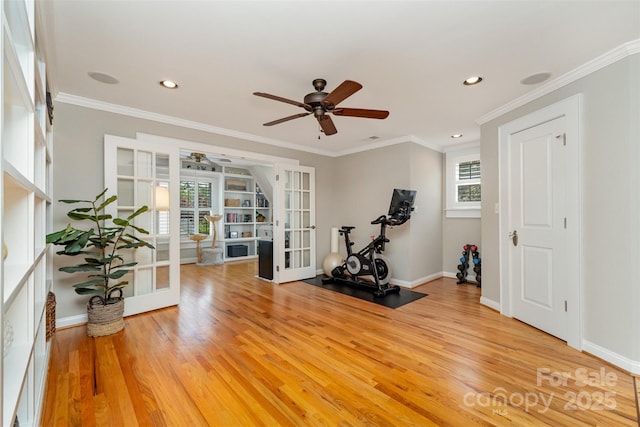 141 Eastover Dr SE, Concord, NC 28025 - workout area with french doors, ceiling fan, light wood finished floors, crown molding, and recessed lighting