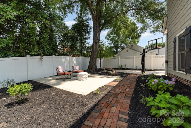 141 Eastover Dr SE, Concord, NC 28025 - fenced backyard with a patio