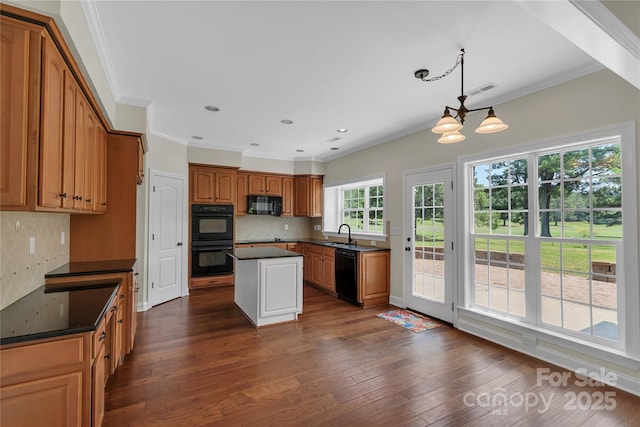 3068 River Rd, Shelby, NC 28152 - kitchen with black appliances, dark countertops, dark wood finished floors, ornamental molding, and backsplash