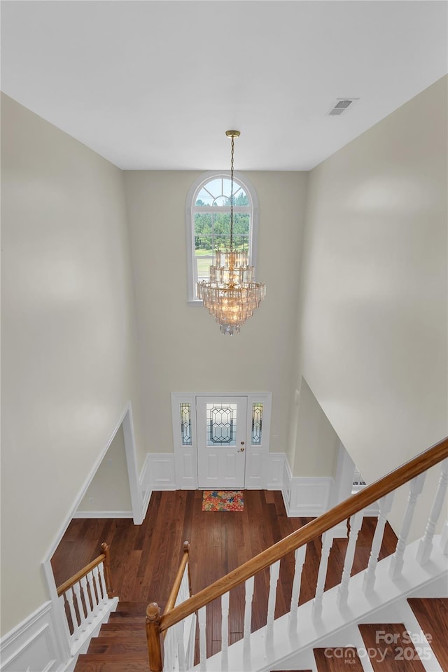 3068 River Rd, Shelby, NC 28152 - foyer entrance with wood finished floors, a chandelier, stairway, and a high ceiling
