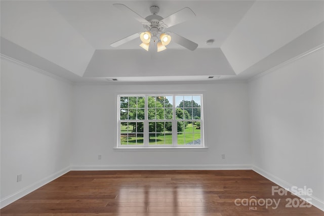 3068 River Rd, Shelby, NC 28152 - unfurnished room featuring a raised ceiling, wood-type flooring, ceiling fan, and crown molding