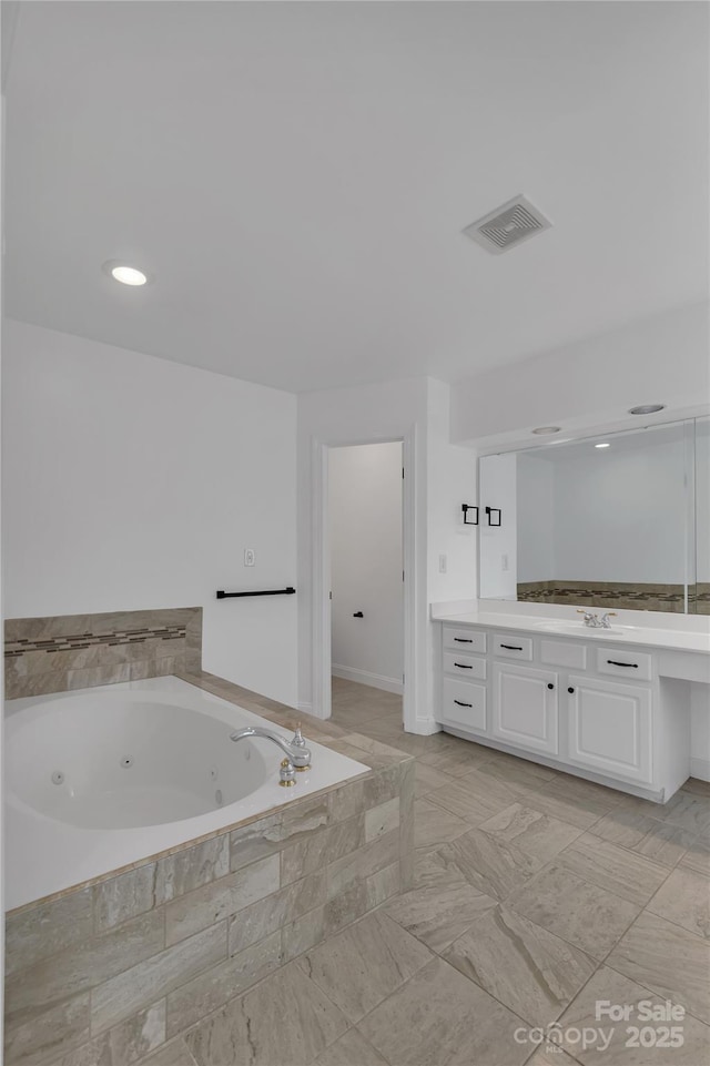 3068 River Rd, Shelby, NC 28152 - bathroom with vanity and a jetted tub