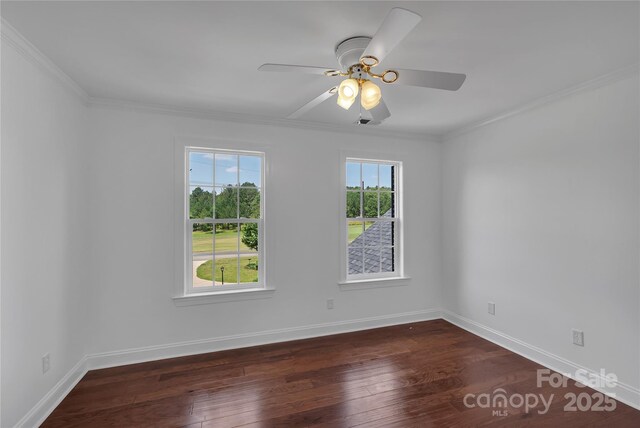 3068 River Rd, Shelby, NC 28152 - unfurnished room featuring dark wood finished floors, baseboards, a ceiling fan, and crown molding