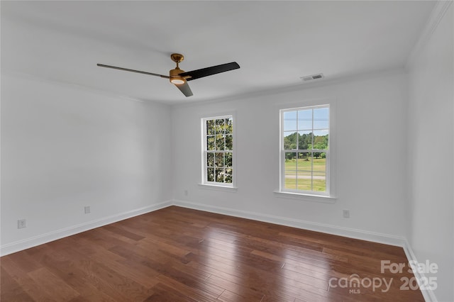3068 River Rd, Shelby, NC 28152 - spare room featuring ornamental molding, baseboards, wood finished floors, and a ceiling fan