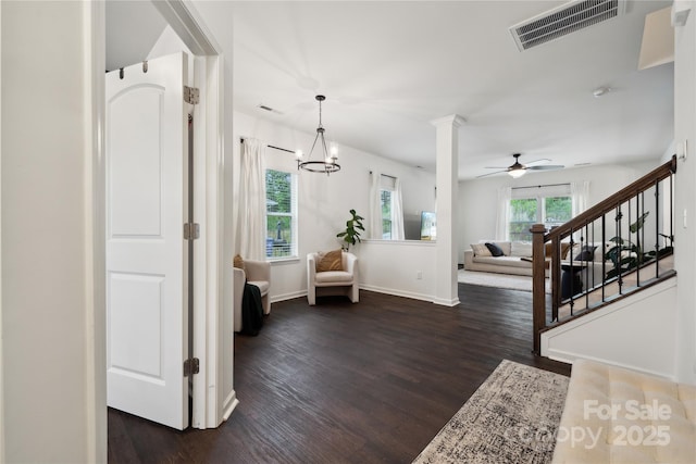 5113 Saddleback Dr, Mount Holly, NC 28120 - entryway with dark wood-style floors, a ceiling fan, baseboards, and stairway