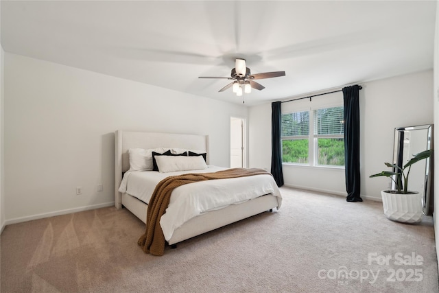 5113 Saddleback Dr, Mount Holly, NC 28120 - carpeted bedroom with baseboards and ceiling fan