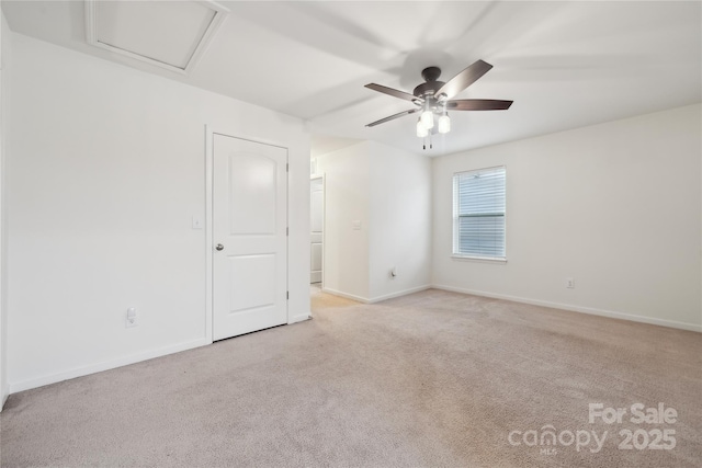 5113 Saddleback Dr, Mount Holly, NC 28120 - empty room with carpet floors, ceiling fan, and baseboards