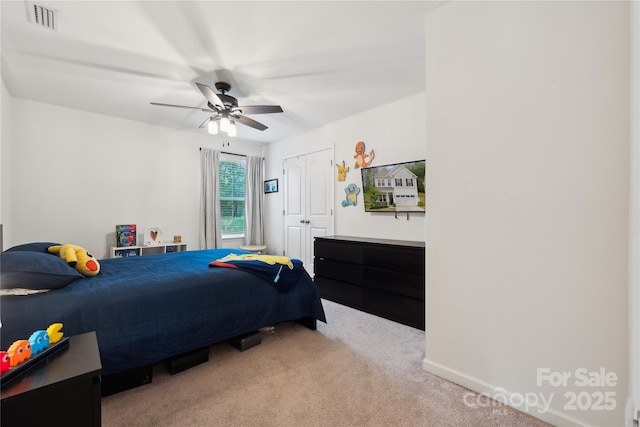 5113 Saddleback Dr, Mount Holly, NC 28120 - carpeted bedroom with a closet and ceiling fan