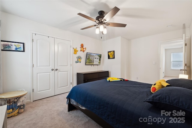 5113 Saddleback Dr, Mount Holly, NC 28120 - carpeted bedroom featuring a closet, ceiling fan, and baseboards
