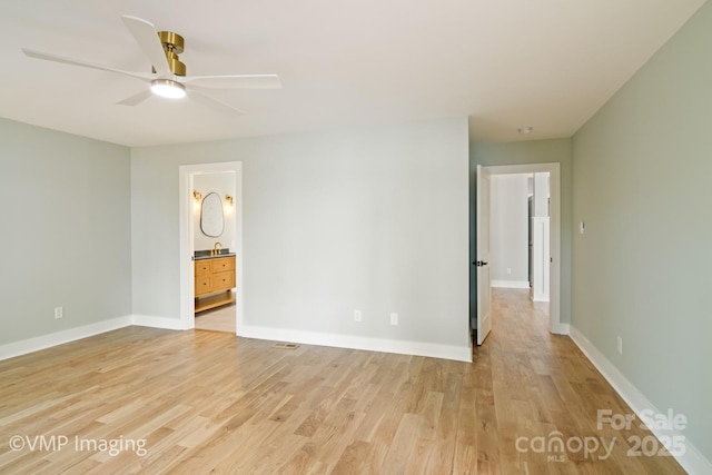 449 Windward Dr, Davidson, NC 28036 - unfurnished room with light wood-style floors, ceiling fan, and baseboards