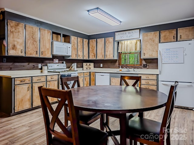 206 Logan Dr, Blacksburg, SC 29702 - kitchen with white appliances, light countertops, light wood finished floors, and a sink