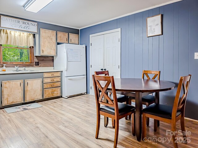 206 Logan Dr, Blacksburg, SC 29702 - dining area with light wood-type flooring and ornamental molding
