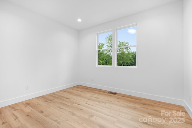 106 Arbor Dr, Waxhaw, NC 28173 - empty room featuring baseboards, wood finished floors, and recessed lighting