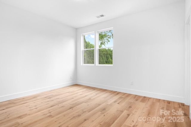 106 Arbor Dr, Waxhaw, NC 28173 - unfurnished room featuring light wood-style floors and baseboards