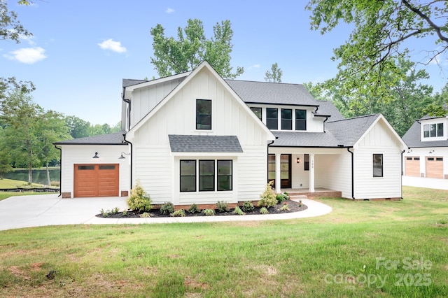 106 Arbor Dr, Waxhaw, NC 28173 - modern farmhouse featuring board and batten siding, an attached garage, a shingled roof, and a front lawn