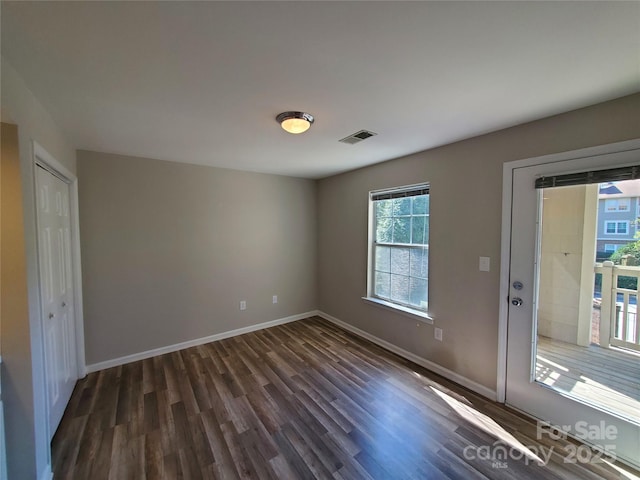 5003 Sharon Rd Unit Q, Charlotte, NC 28210 - spare room featuring dark wood-type flooring and baseboards
