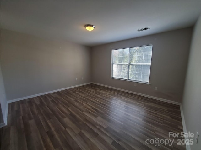 5003 Sharon Rd Unit Q, Charlotte, NC 28210 - spare room with dark wood-style flooring and baseboards