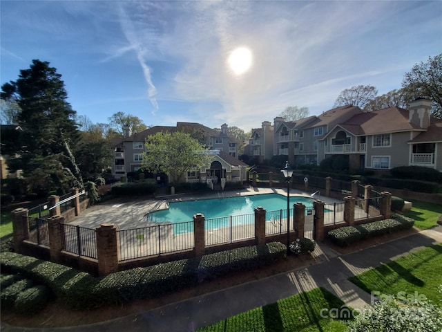 5003 Sharon Rd Unit Q, Charlotte, NC 28210 - community pool featuring a residential view and a patio