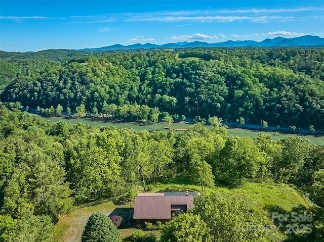55 Dane Acres Dr, Alexander, NC 28701 - drone / aerial view of a heavily wooded area and a mountainous background