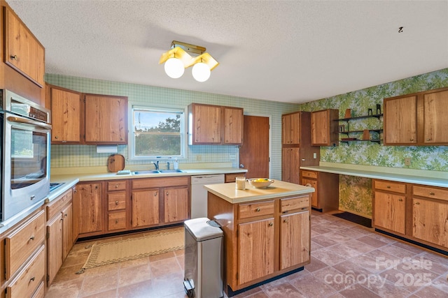55 Dane Acres Dr, Alexander, NC 28701 - kitchen featuring wallpapered walls, white dishwasher, oven, a sink, and open shelves