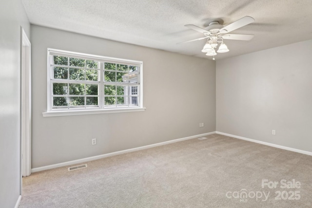 8510 Castle Pine Ct, Charlotte, NC 28226 - carpeted spare room featuring ceiling fan, a textured ceiling, and baseboards