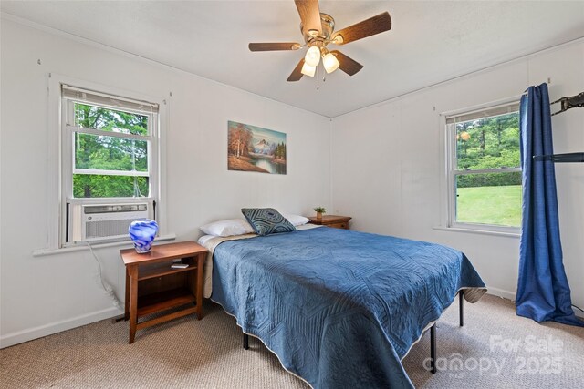 48 Medford Ave, Waynesville, NC 28786 - carpeted bedroom featuring cooling unit, baseboards, and ceiling fan