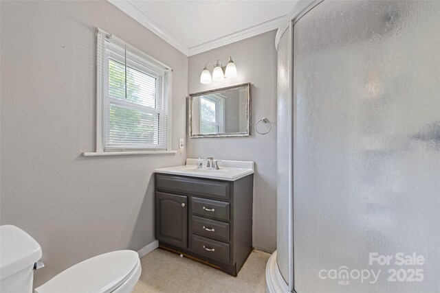 48 Medford Ave, Waynesville, NC 28786 - bathroom featuring toilet, a stall shower, vanity, ornamental molding, and baseboards