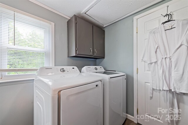 48 Medford Ave, Waynesville, NC 28786 - laundry area with cabinet space, washer and clothes dryer, and a textured ceiling