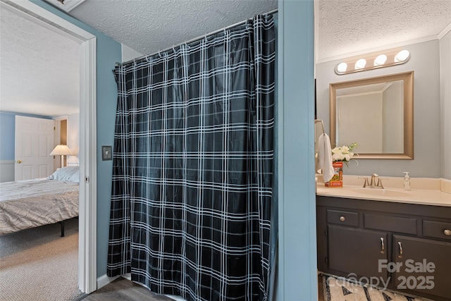 48 Medford Ave, Waynesville, NC 28786 - full bathroom with a textured ceiling, vanity, ensuite bathroom, and curtained shower