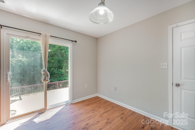 8524 Emerald Fern Way, Charlotte, NC 28214 - spare room with wood finished floors and baseboards