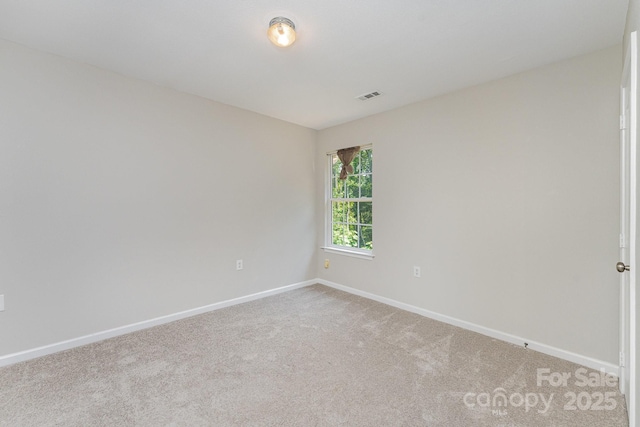 8524 Emerald Fern Way, Charlotte, NC 28214 - spare room featuring baseboards and carpet floors