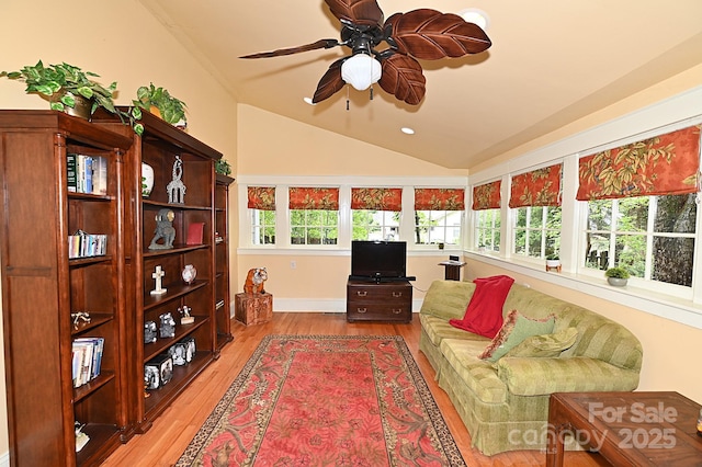 616 N Deal Ave, Newton, NC 28658 - living area with lofted ceiling, light wood finished floors, ceiling fan, and recessed lighting