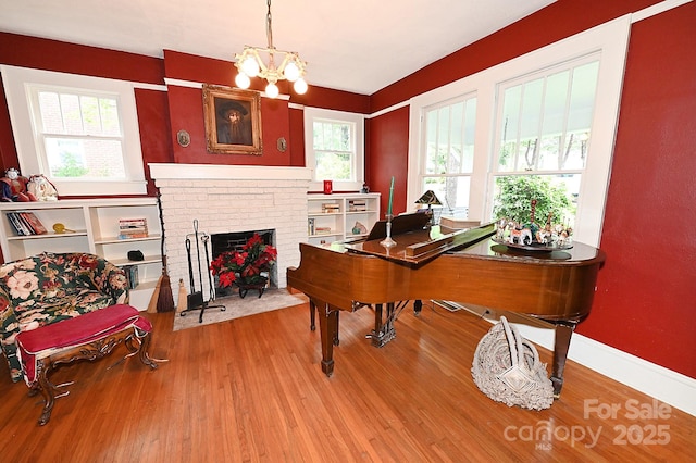 616 N Deal Ave, Newton, NC 28658 - office featuring wood finished floors, plenty of natural light, and a chandelier